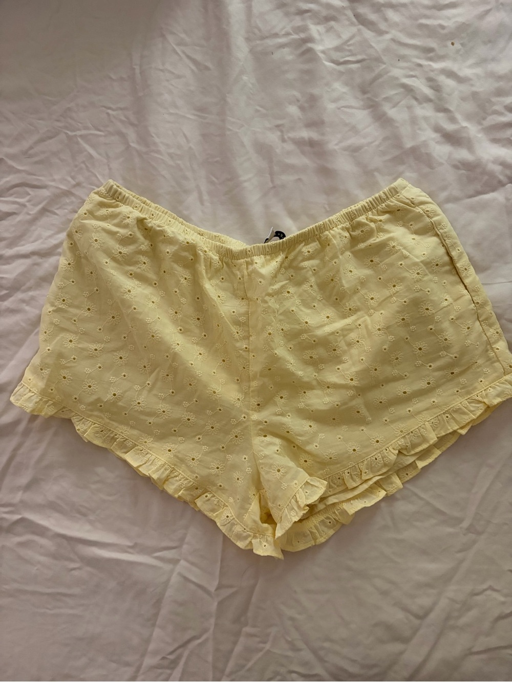 NWT Eyelet Ruffle Hem Shorts in Pale Yellow